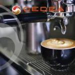 Macchina del caffè professionale in un bar, simbolo dei rischi valutati nel DVR bar redatto da CEDEA.